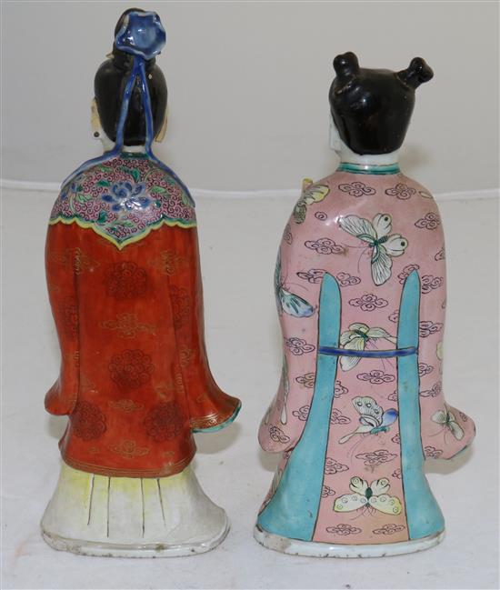 Two Chinese famille rose enamelled figures of female immortals, late 18th century, 26 and 24.5cm, losses and restoration